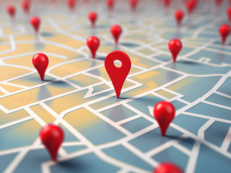 map with multiple red pins indicating locations in the city